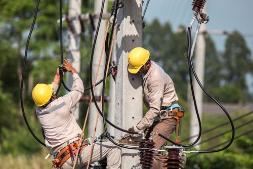 Workers repair utility lines